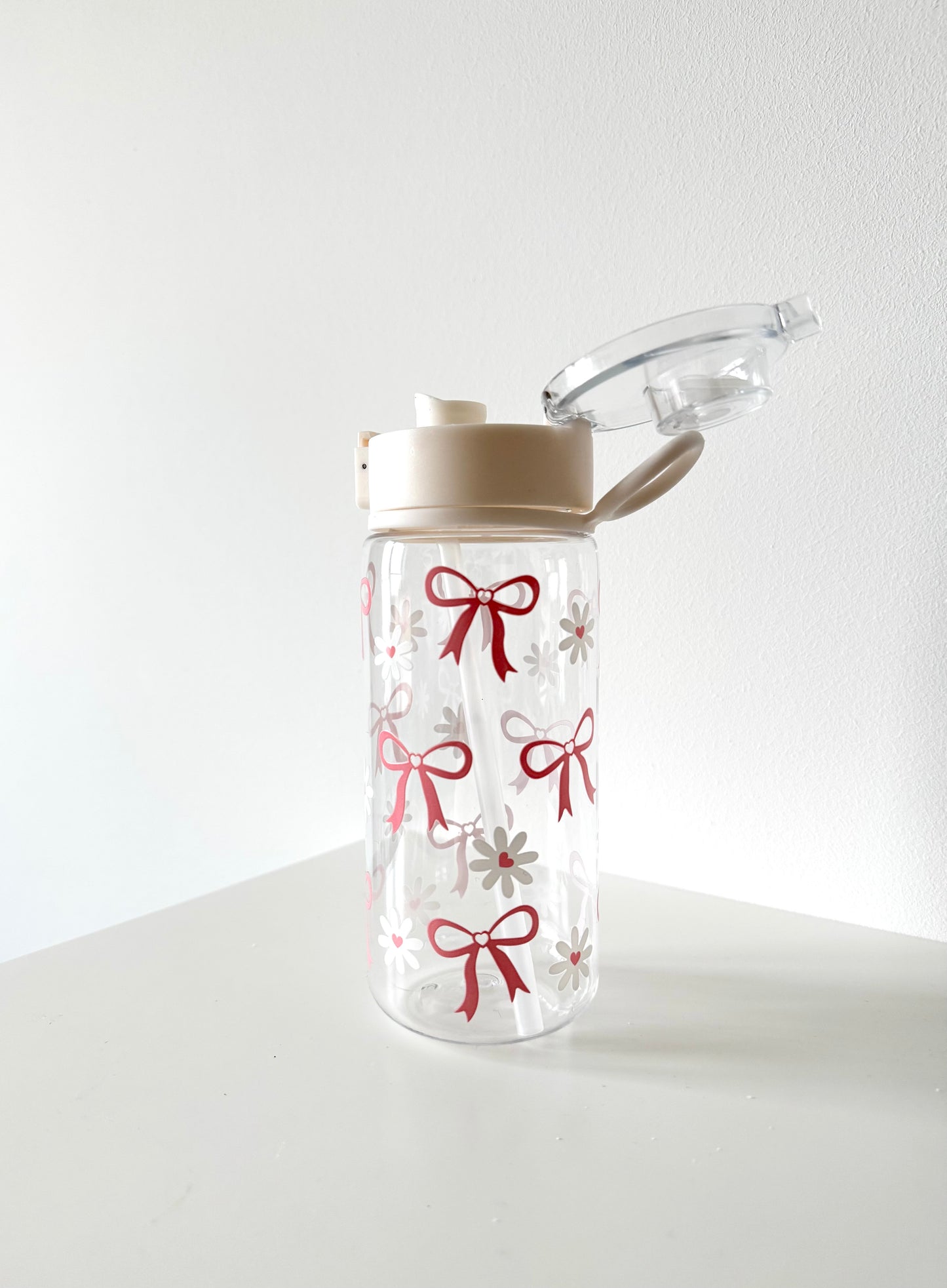 Süße Trinkflasche mit Schleifen- & Blumenmotiv – auslaufsicherer Klappdeckel
