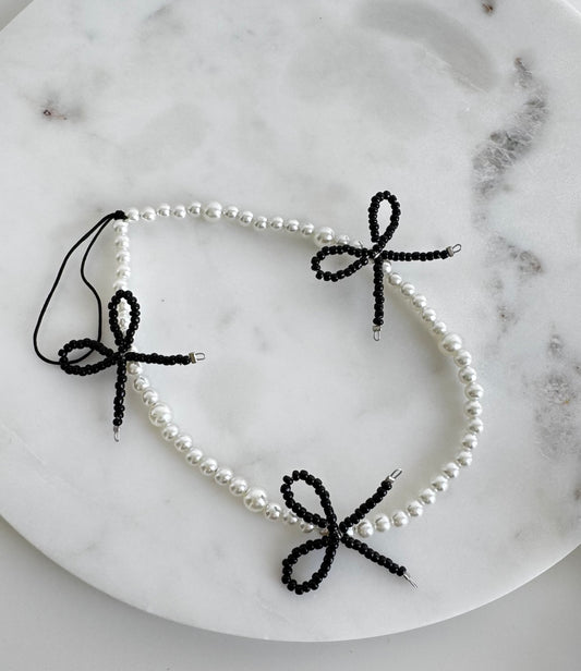 Schlüsselanhänger mit schwarzen Schleifen